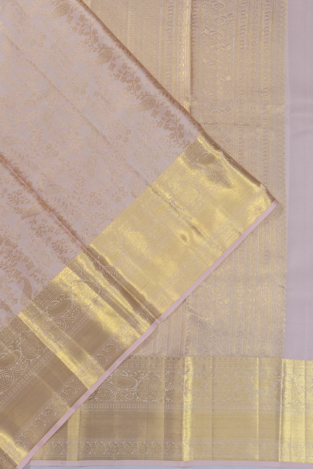 Taranga Kanchi Silk Brocade Cream Saree