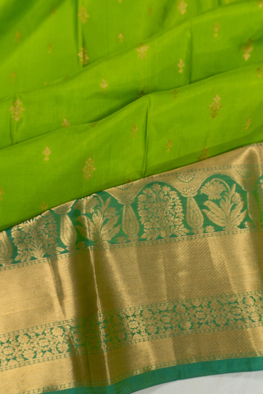 Taranga Kanchi Silk Butta Parrot Green Saree