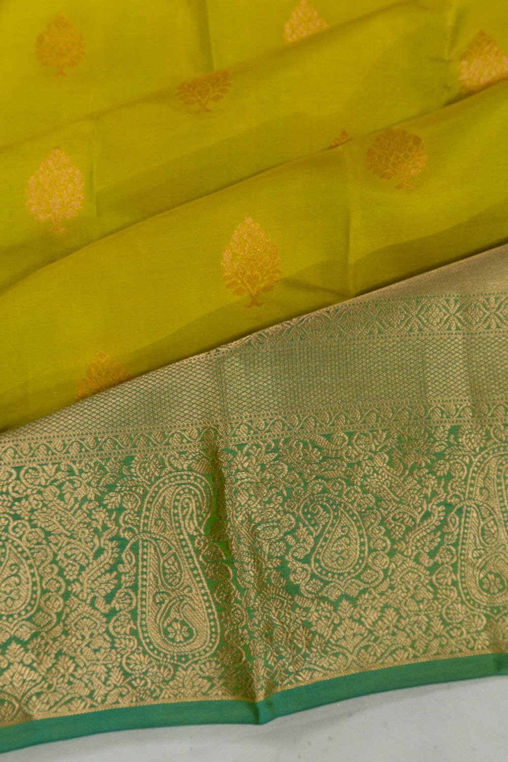 Taranga Kanchi Silk Butta Mehendi Green Saree