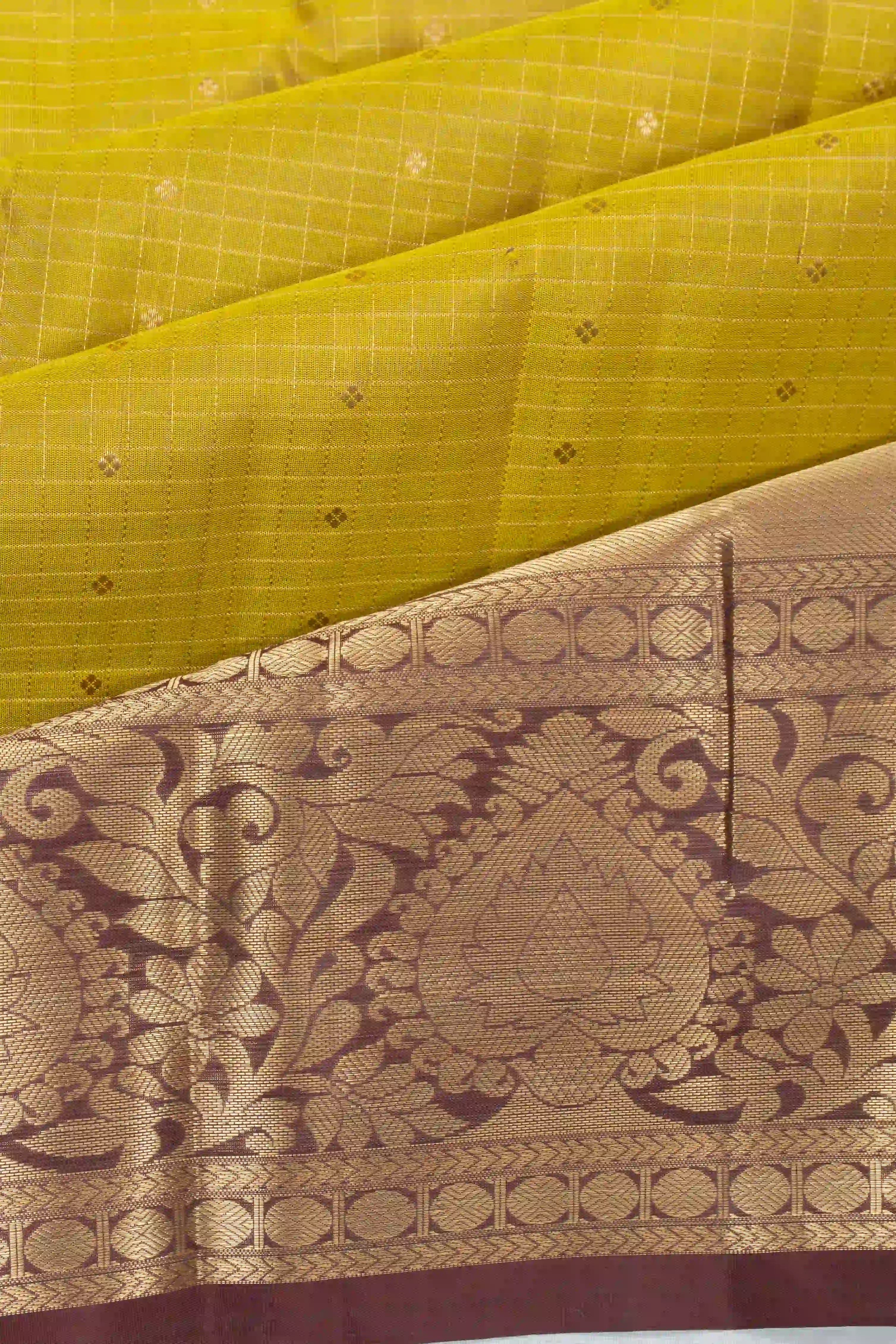 Taranga Kanchi Silk Checks And Butta Mehendi Green Saree