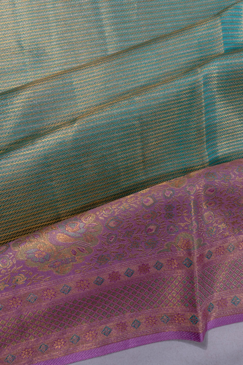 Taranga Kanchi Silk Tissue Brocade Green Saree