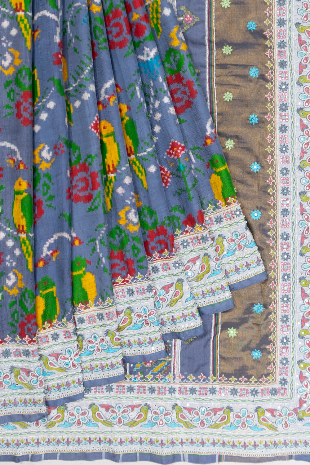 Patan Patola Silk Double Ikat Powder Blue Saree With Kutch Hand Embroidery Border