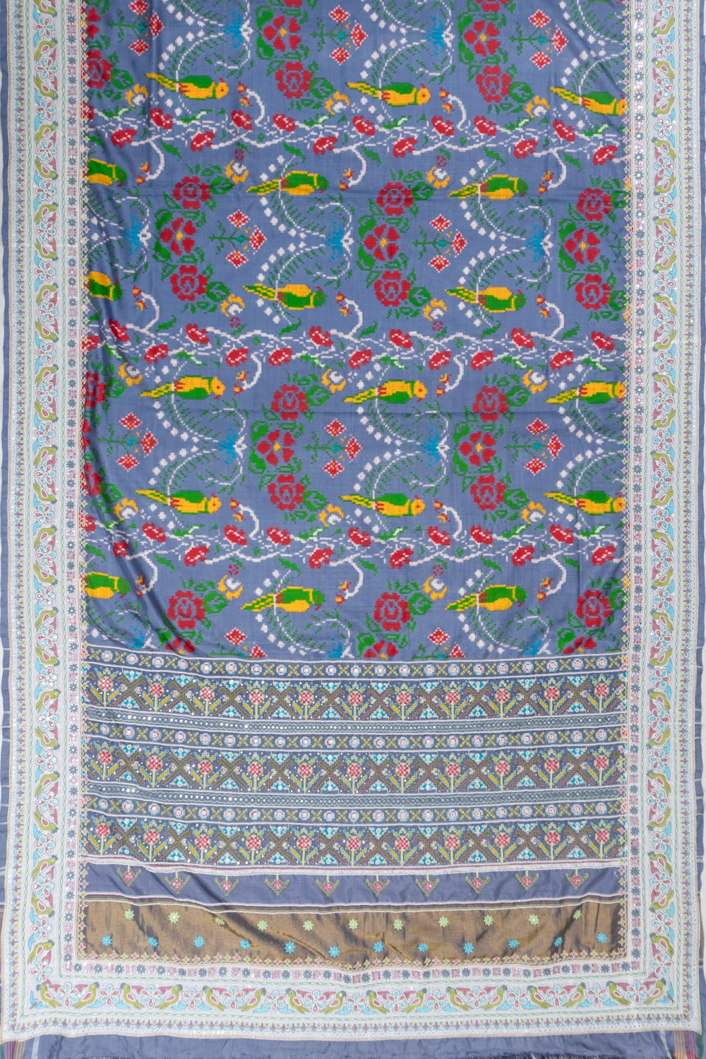 Patan Patola Silk Double Ikat Powder Blue Saree With Kutch Hand Embroidery Border