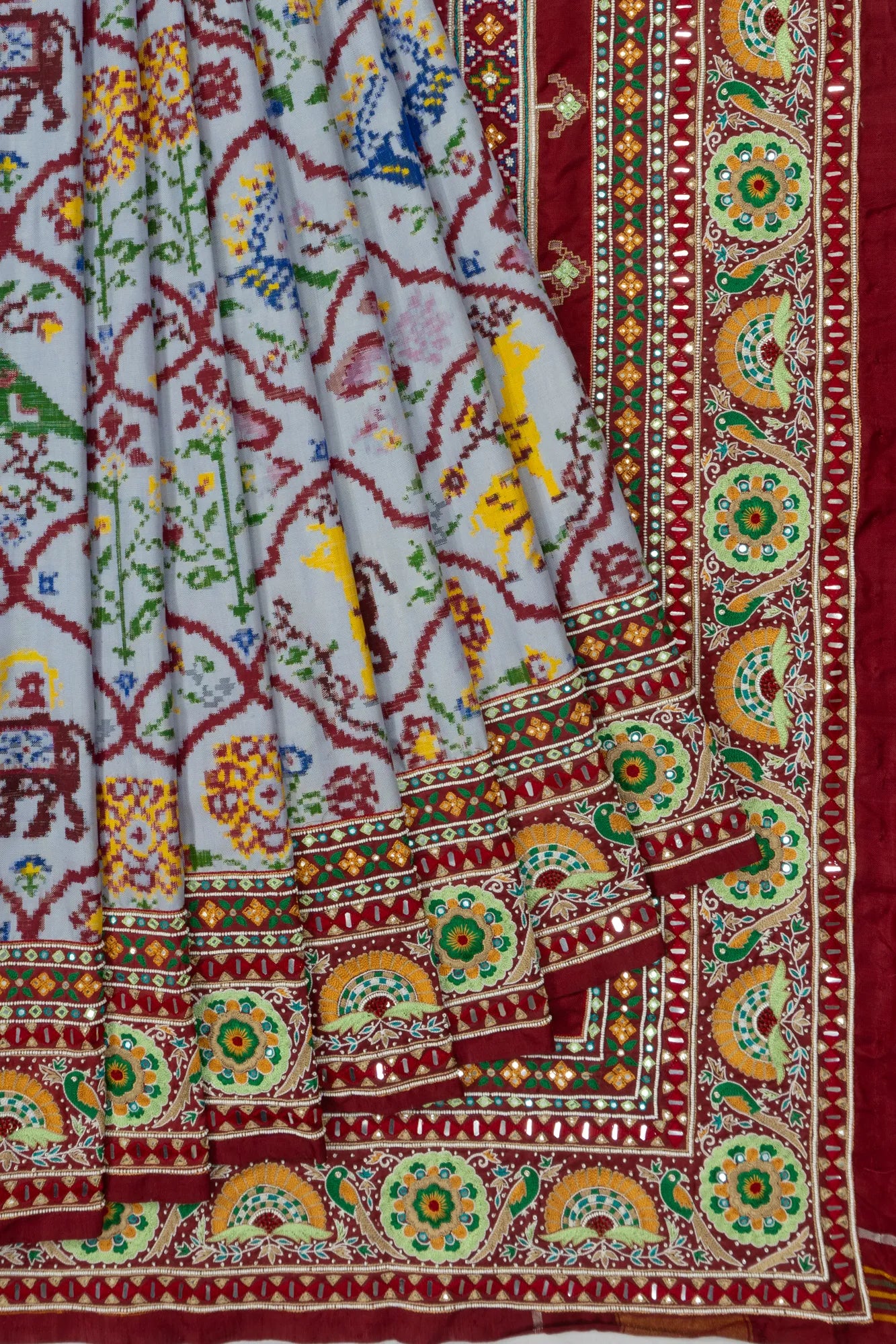 Patan Patola Silk Double Ikat Powder Blue Saree With Kutch Hand Embroidery Border