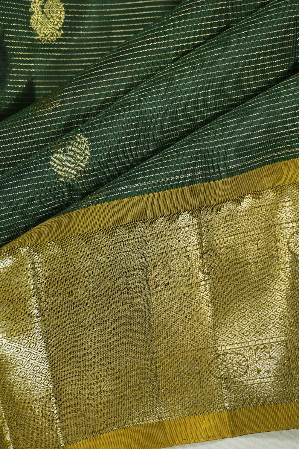 Taranga Kanchi Silk Lines And Butta Dark Green Saree