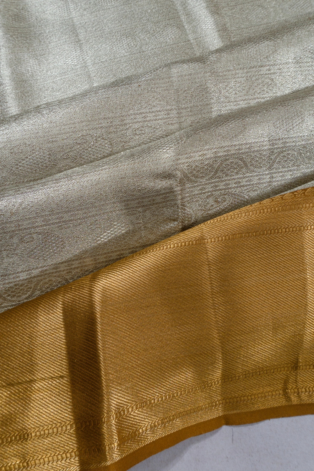 Taranga Kanchi Silk Tissue Brocade Silver Saree