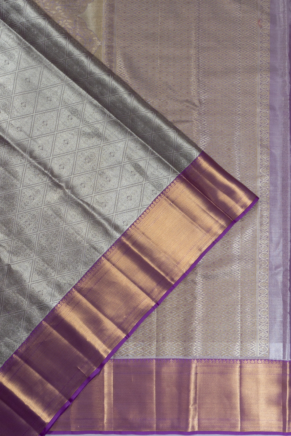 Taranga Kanchi Silk Tissue Brocade Silver Saree