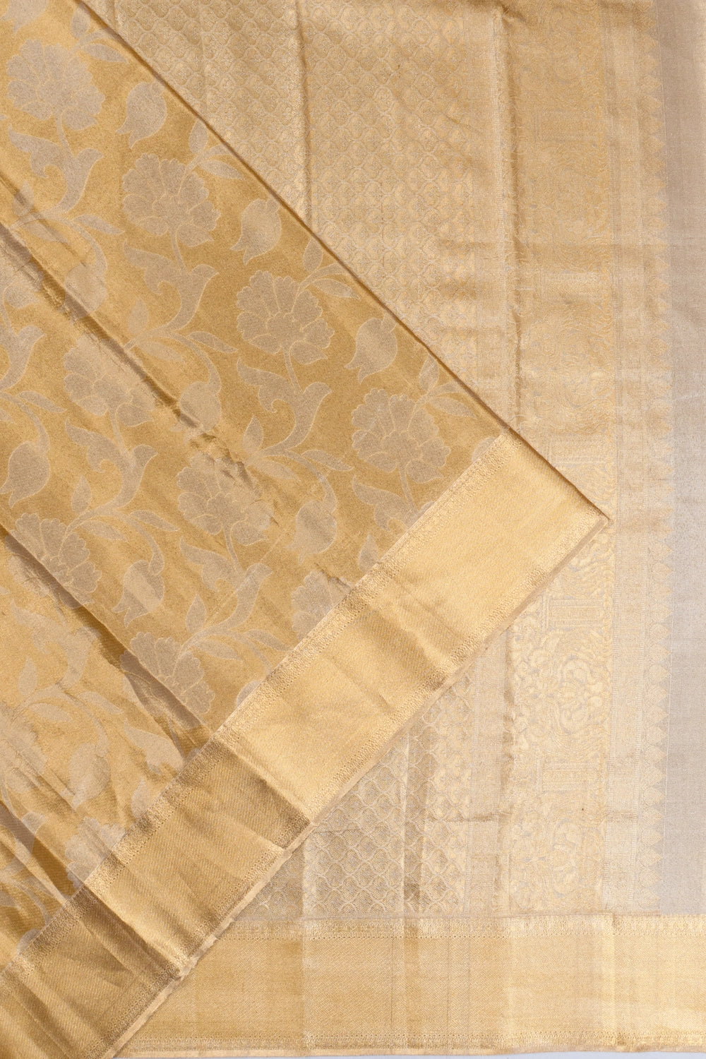 Taranga Kanchi Silk Tissue Jaal Gold Saree