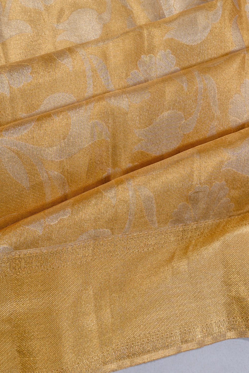 Taranga Kanchi Silk Tissue Jaal Gold Saree
