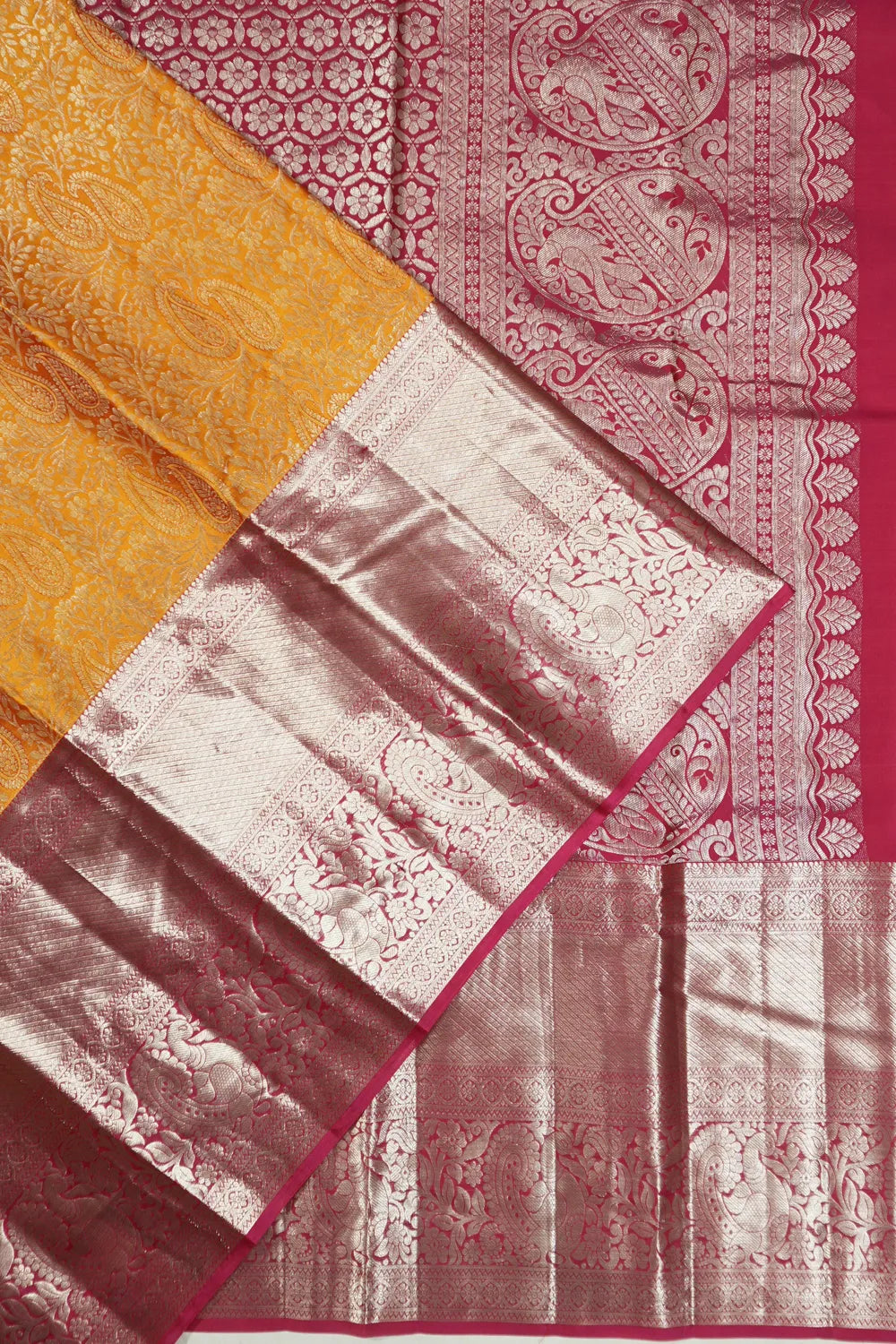 Taranga Kanchi Silk Jaal Yellow Saree