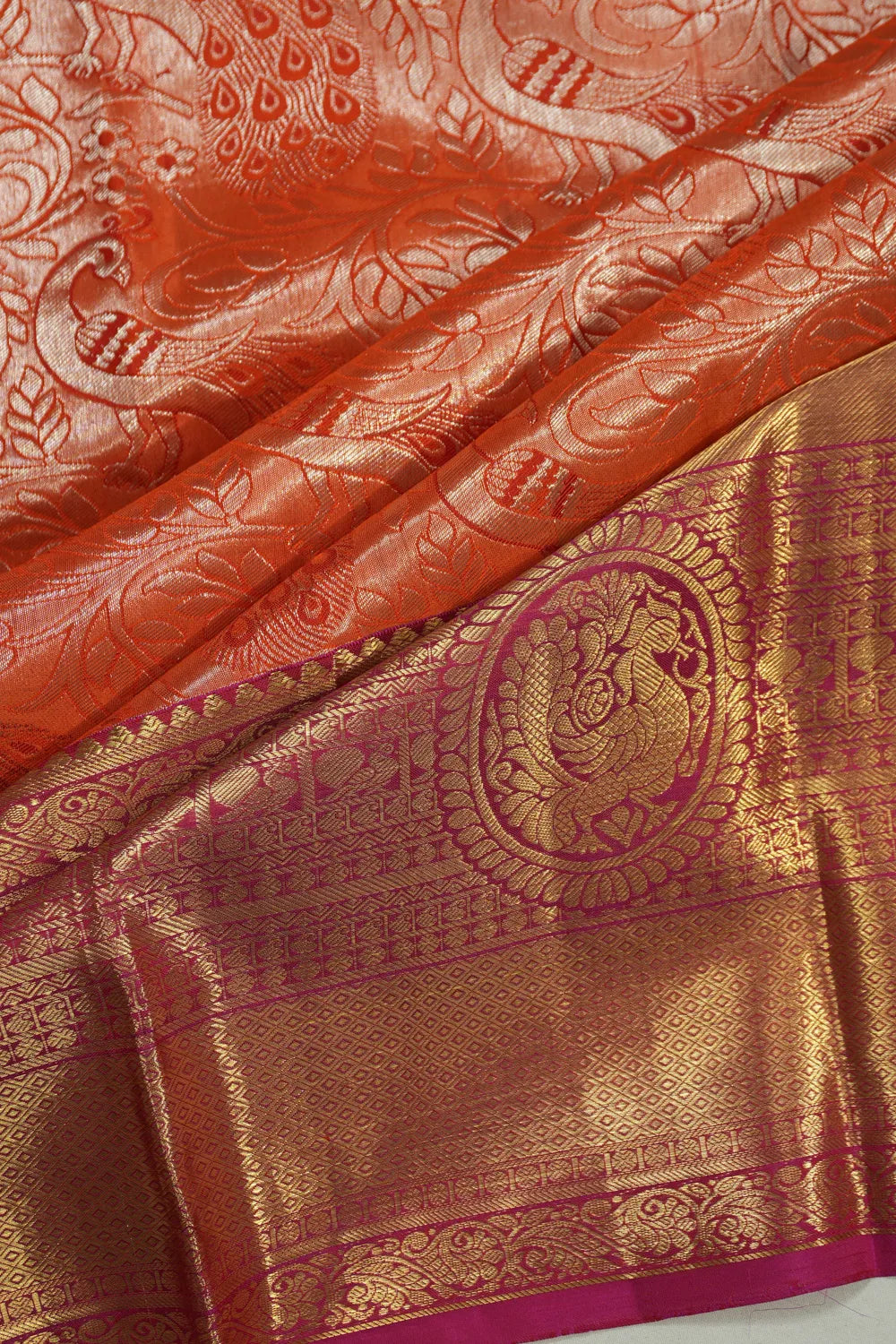 Taranga Kanchi Silk Jaal Orange Saree
