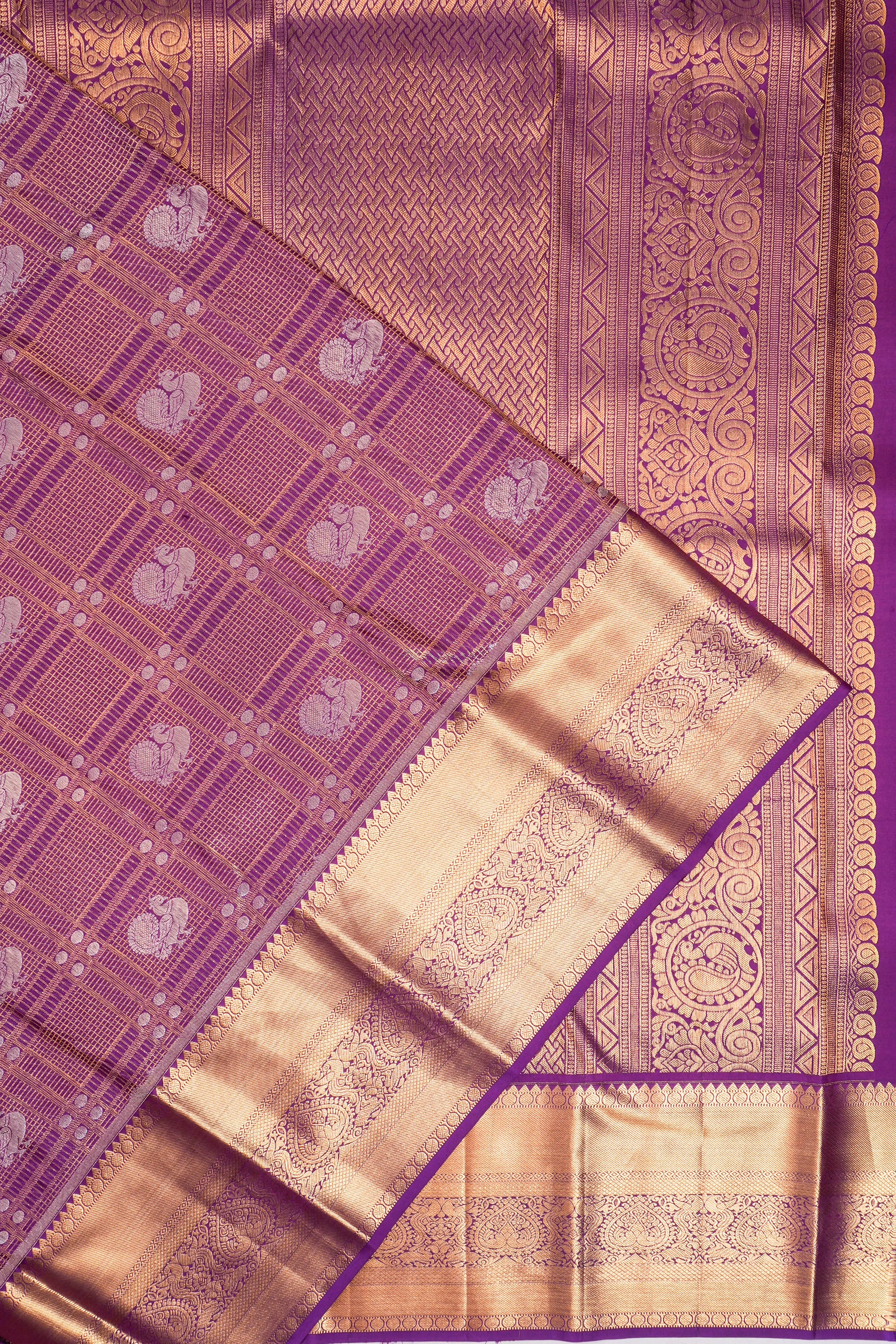 Taranga Kanchi Silk Checks And Butta Purple Saree