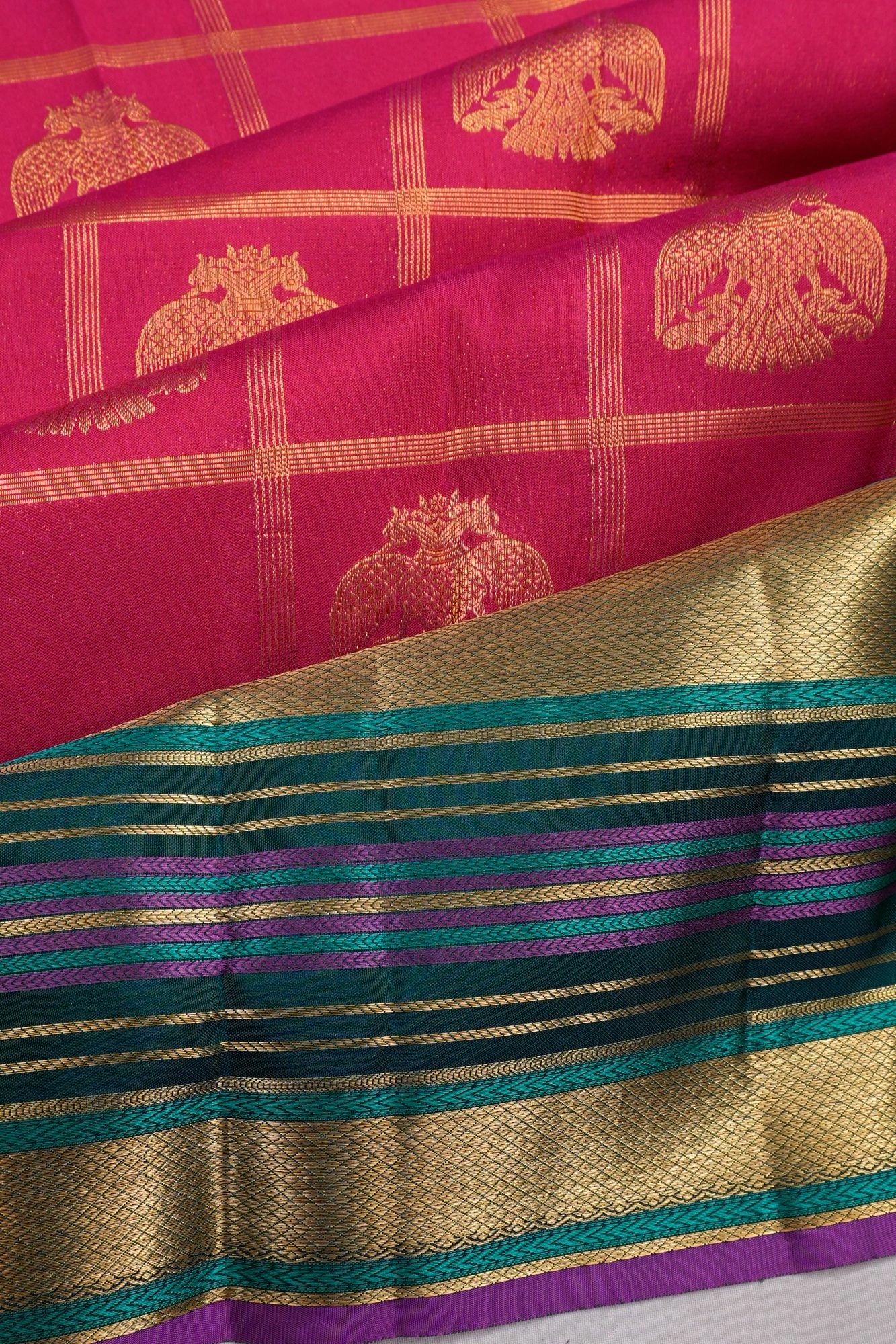 Taranga Kanchi Silk Checks And Butta Rani Pink Saree