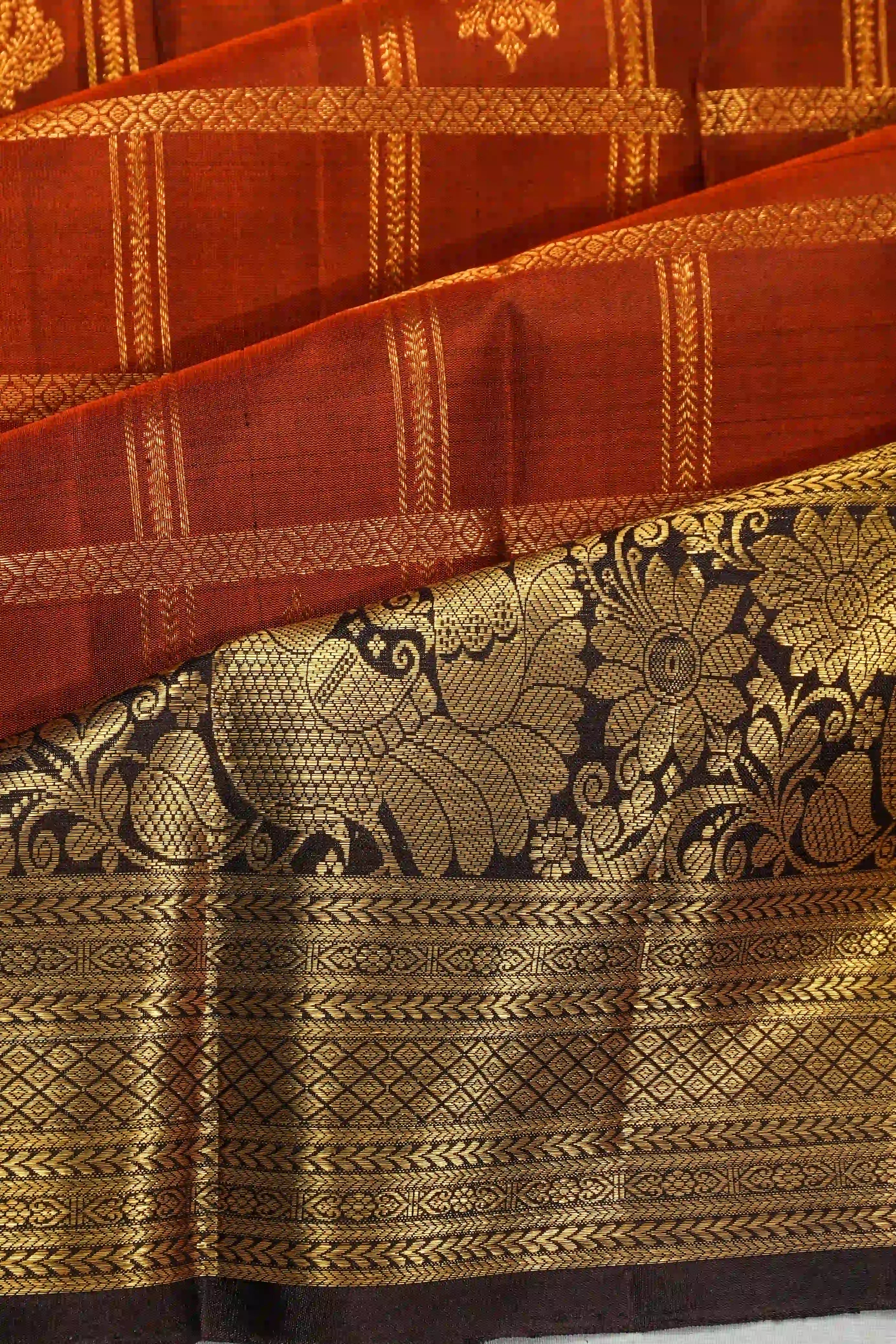 Kanchipuram Silk Checks And Butta Rust Orange Saree
