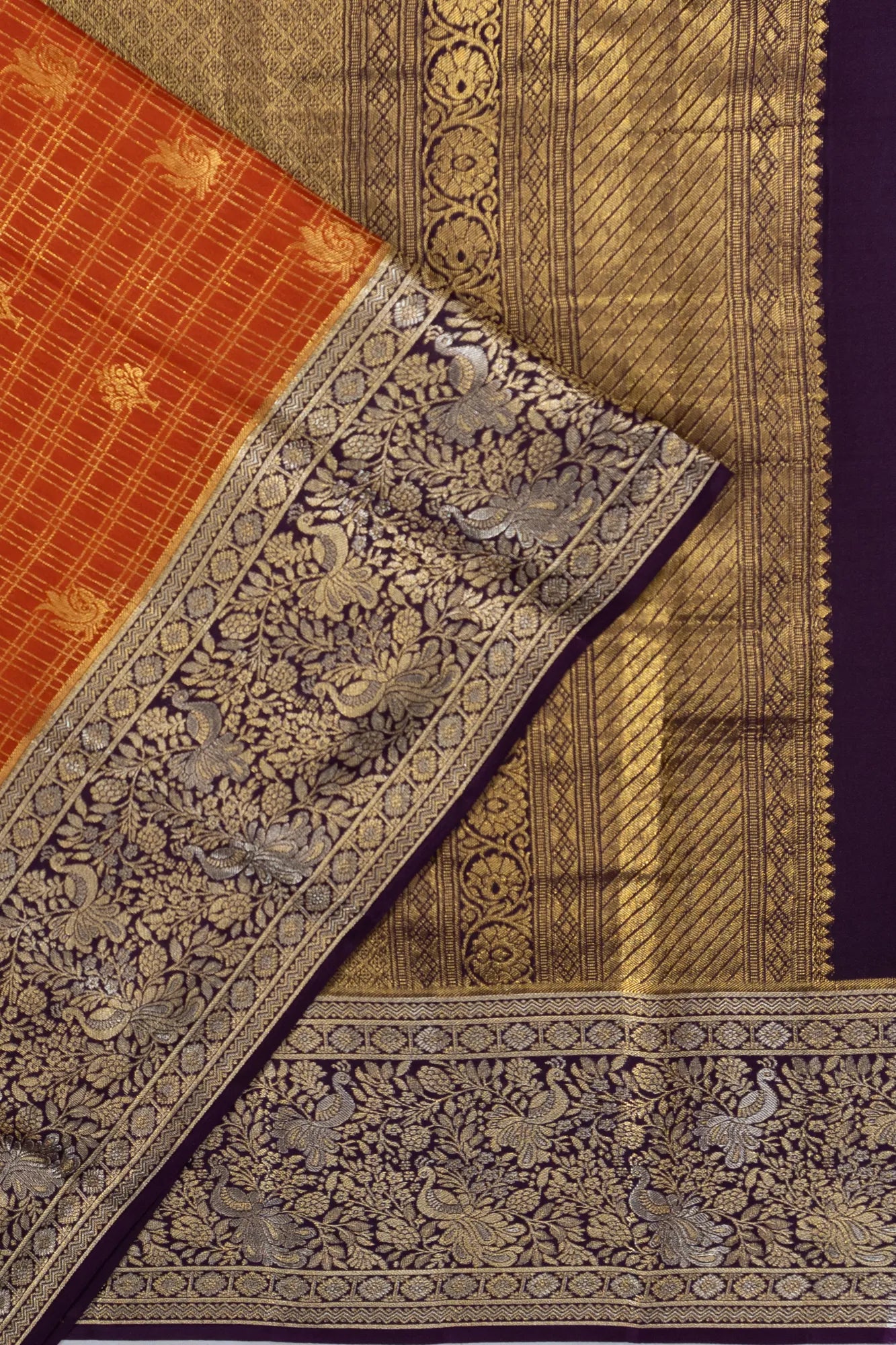Taranga Kanchi Silk Checks And Butta Orange Saree