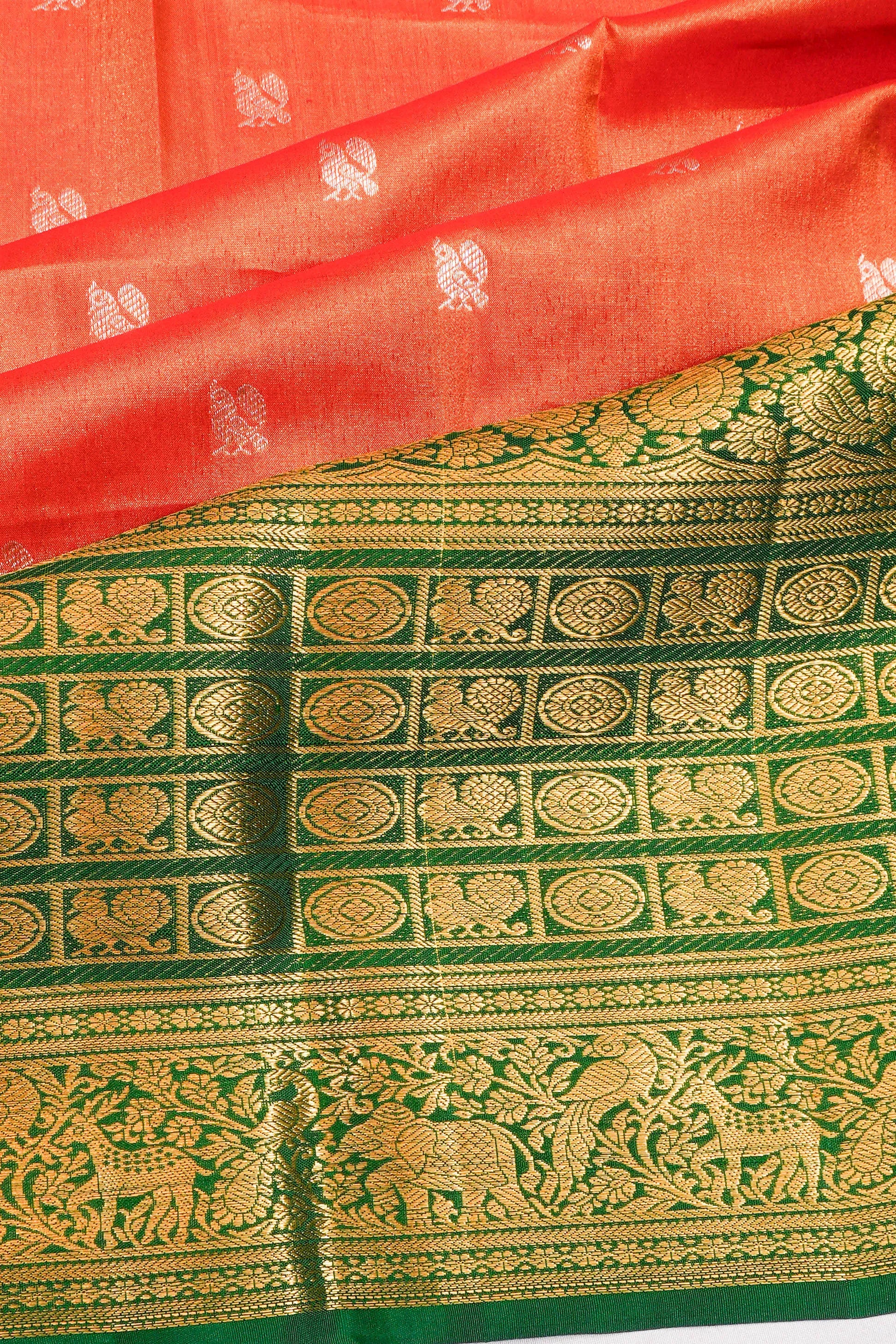 Taranga Kanchi Silk Butta Orange Saree