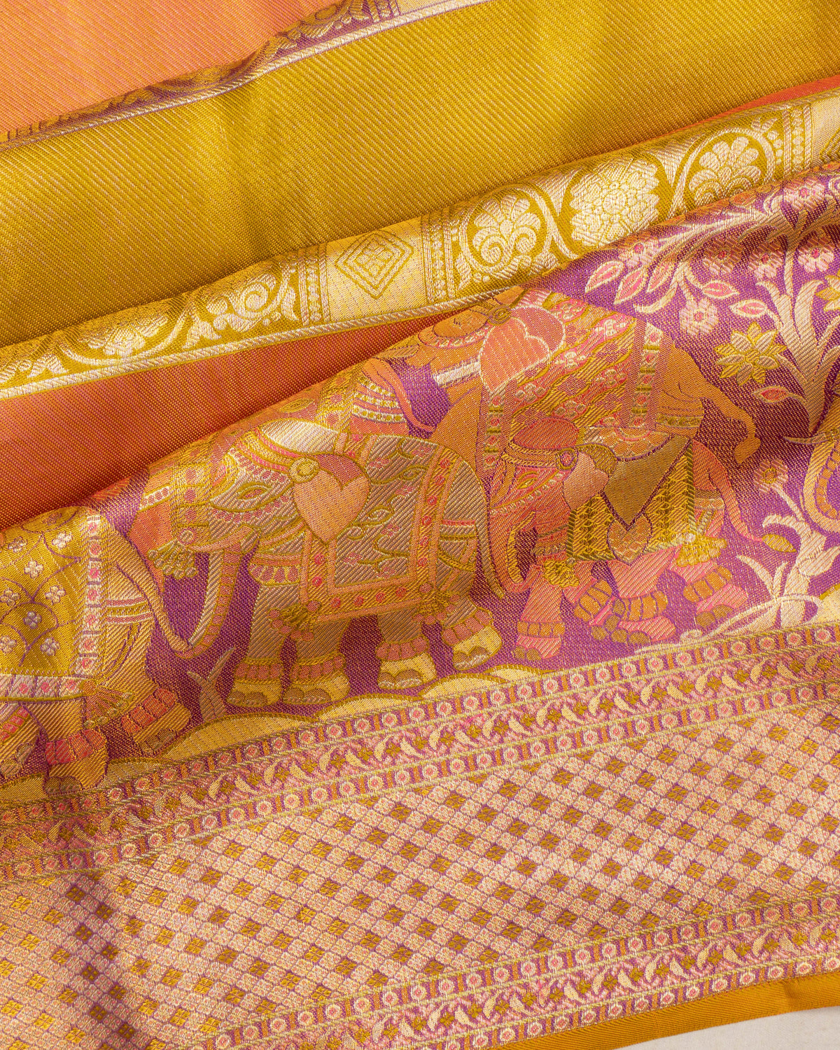 Taranga Kanchi Silk Tissue Lines And Brocade Multicolour Saree