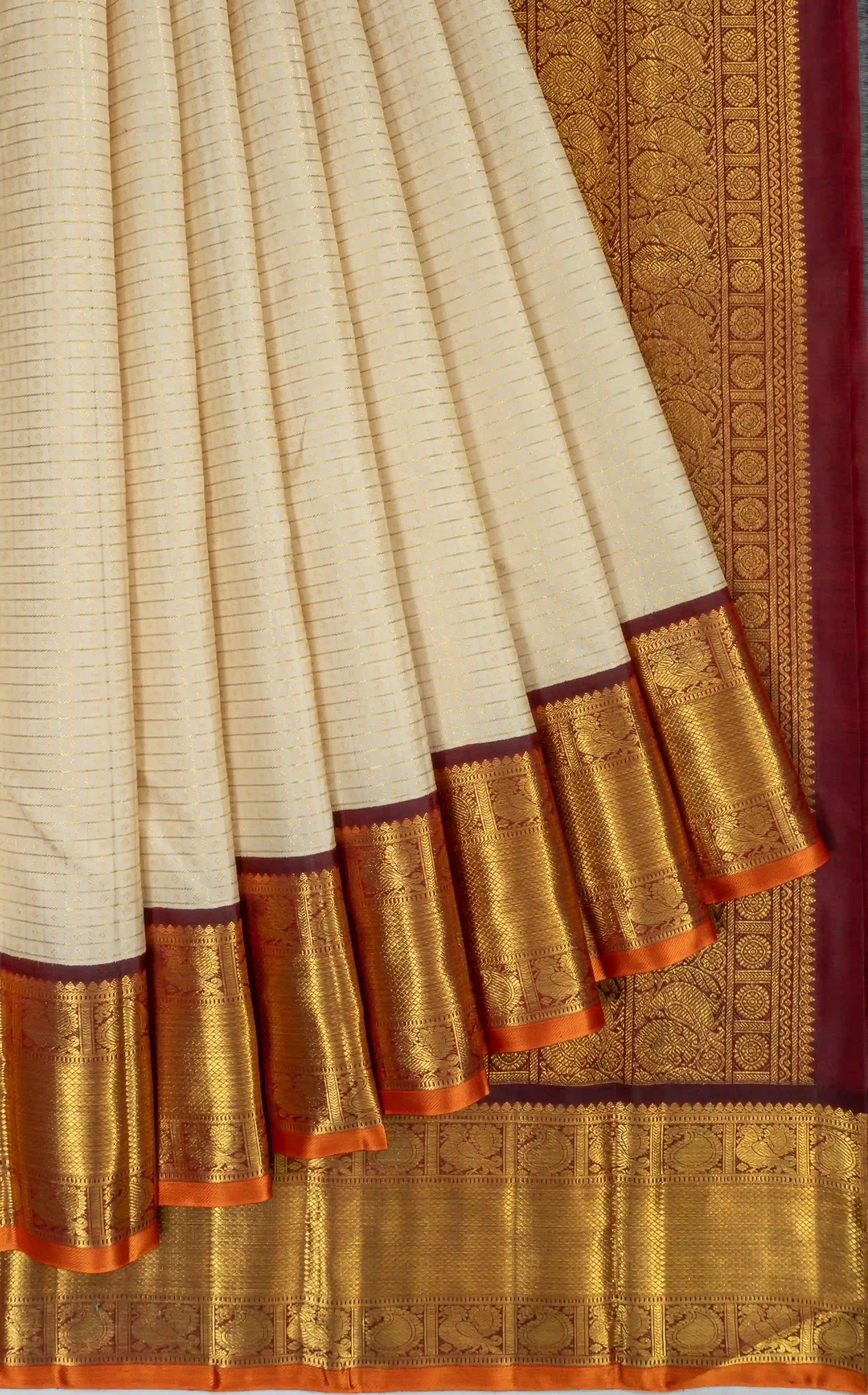 Kanchipuram Silk Checks And Butta Cream Saree