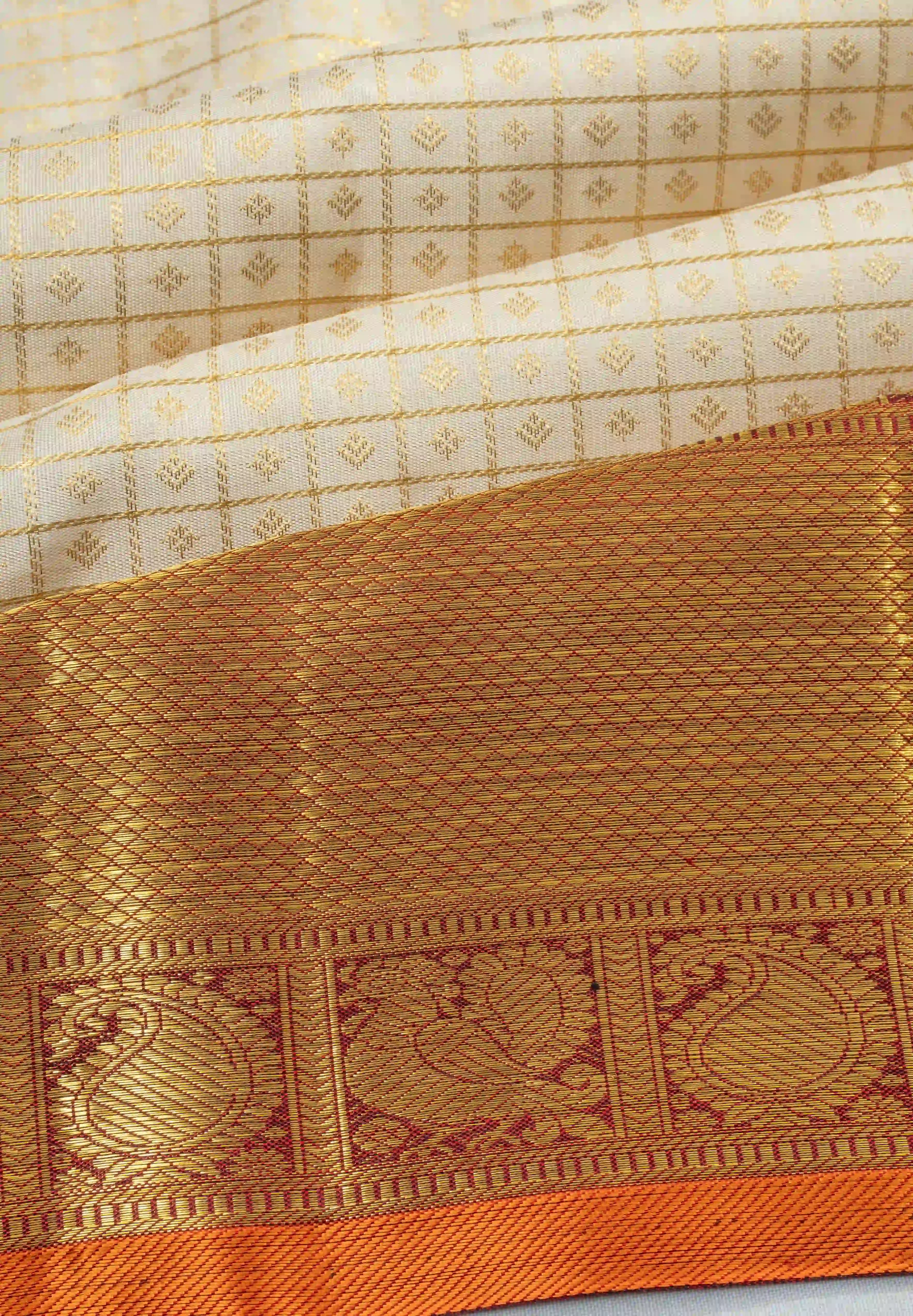 Kanchipuram Silk Checks And Butta Cream Saree