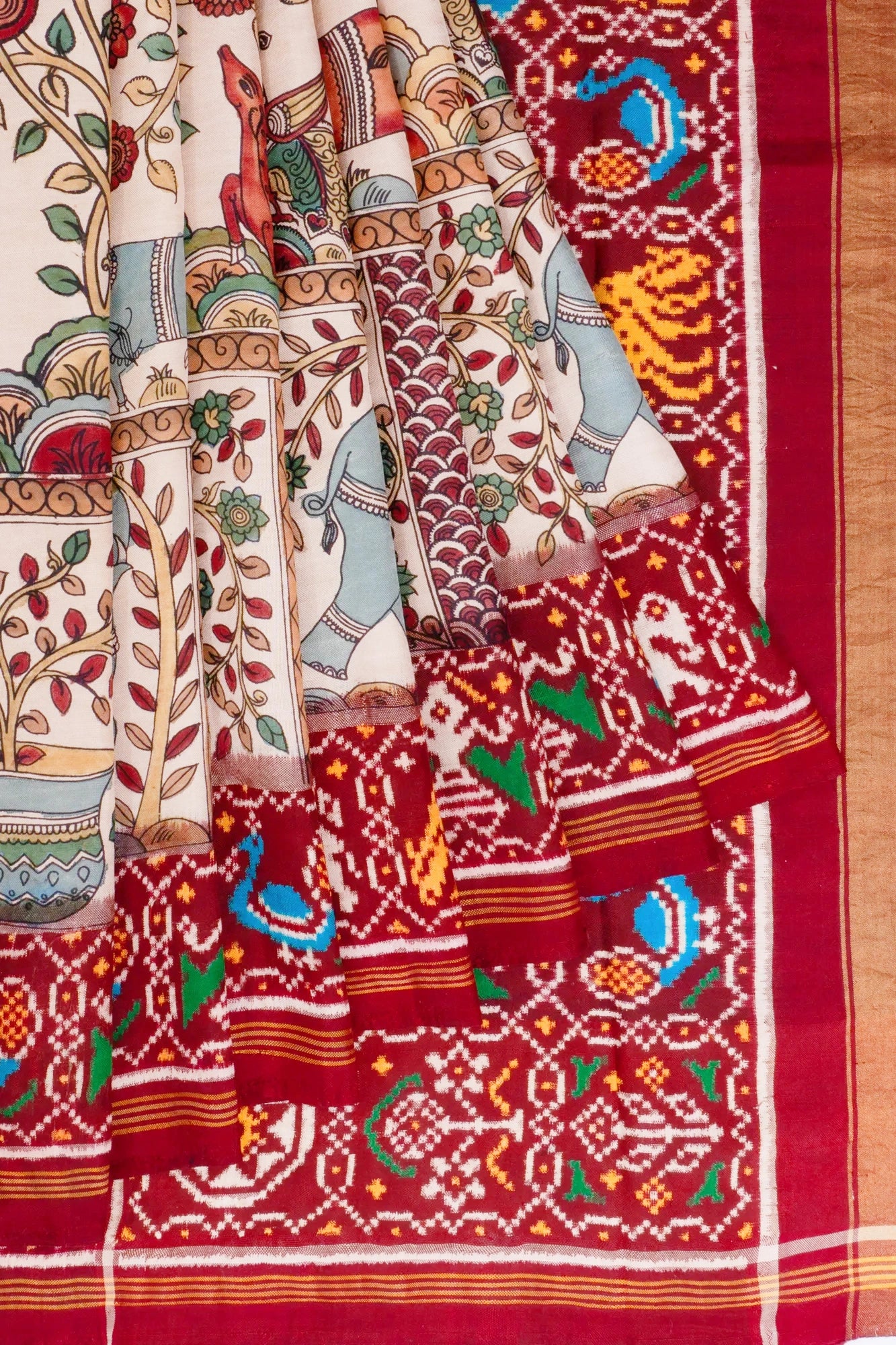 Kalamkari Hand Painted X Patan Patola Silk Double Ikat Cream Saree With 6 Figure Border