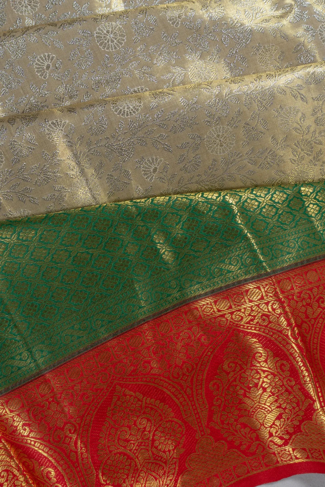 Taranga Kanchi Silk Tissue Brocade Gold Saree