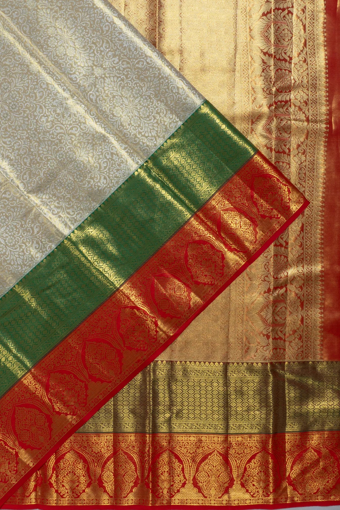 Taranga Kanchi Silk Tissue Brocade Gold Saree