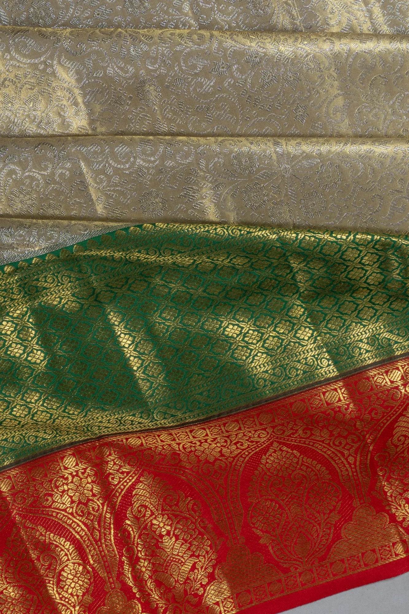 Taranga Kanchi Silk Tissue Brocade Gold Saree