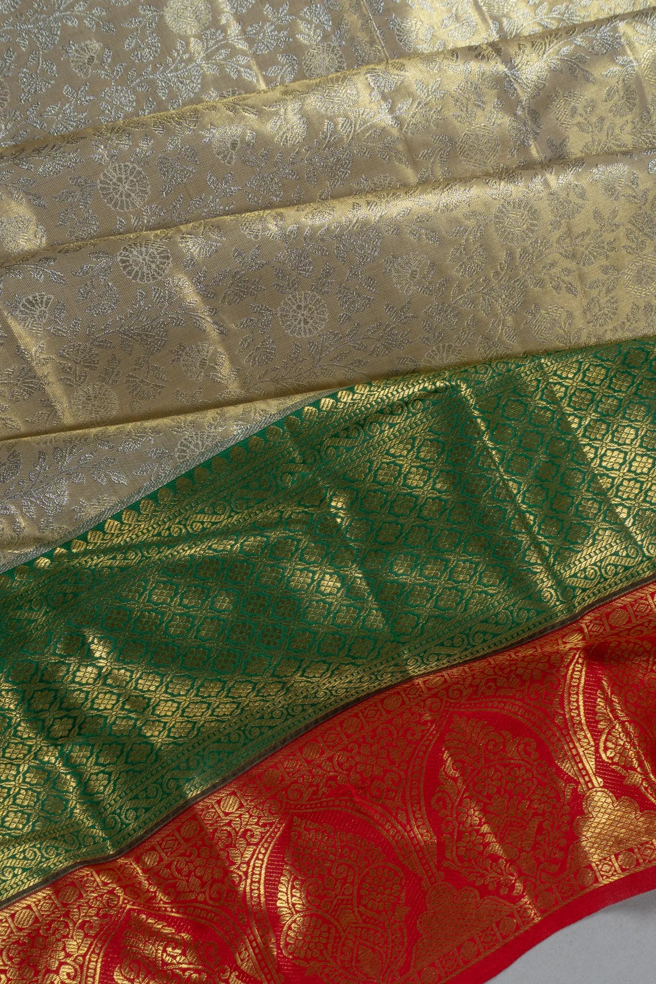 Taranga Kanchi Silk Tissue Brocade Gold Saree