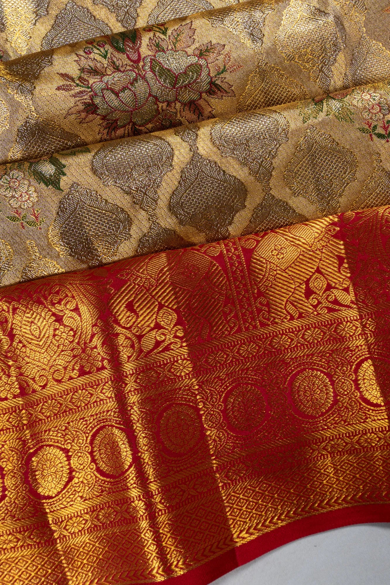 Taranga Kanchi Silk Tissue Brocade Gold Saree