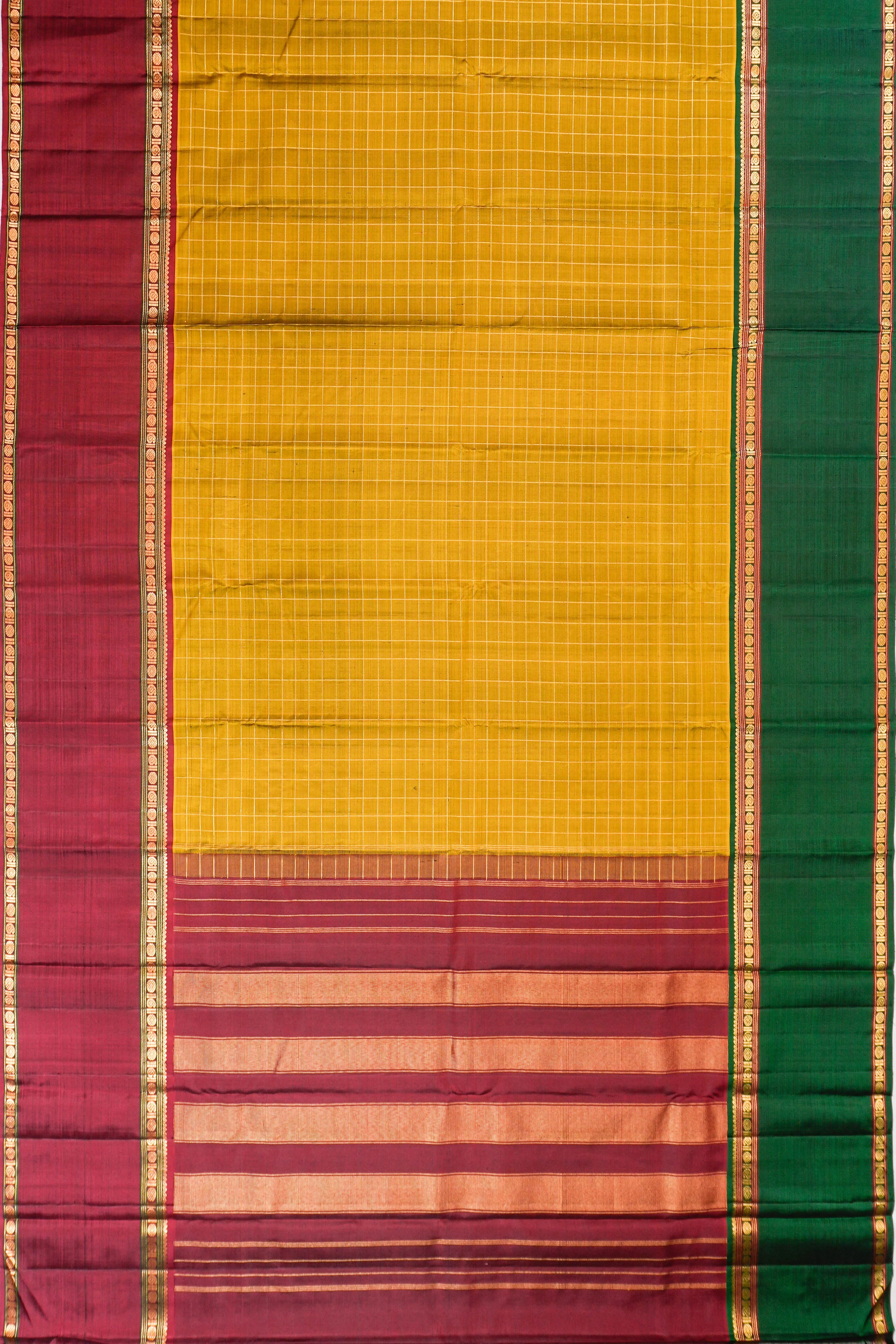 Taranga Kanchi Silk Checks Yellow Saree With Ganga Jamuna Border