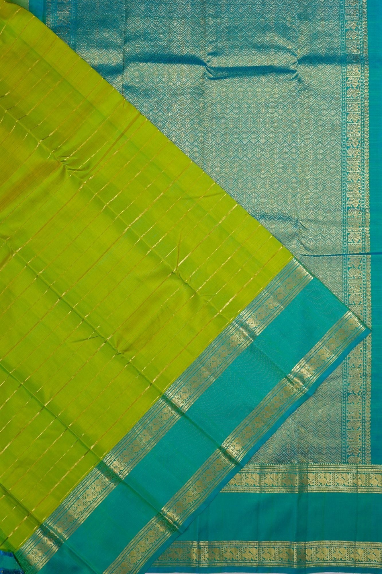 Taranga Kanchi Silk Lines Parrot Green Saree With Rettai Pettu Border