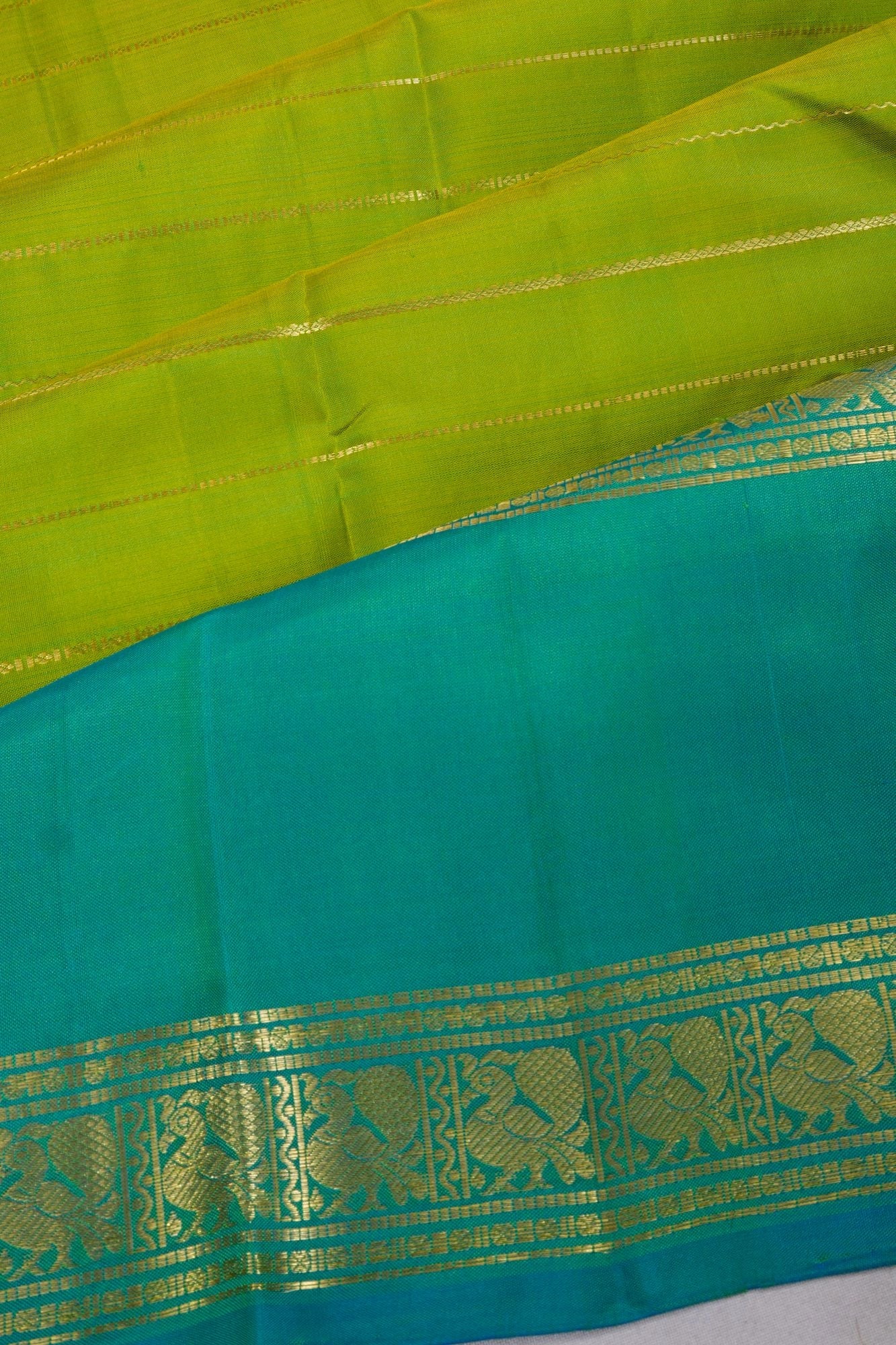 Taranga Kanchi Silk Lines Parrot Green Saree With Rettai Pettu Border