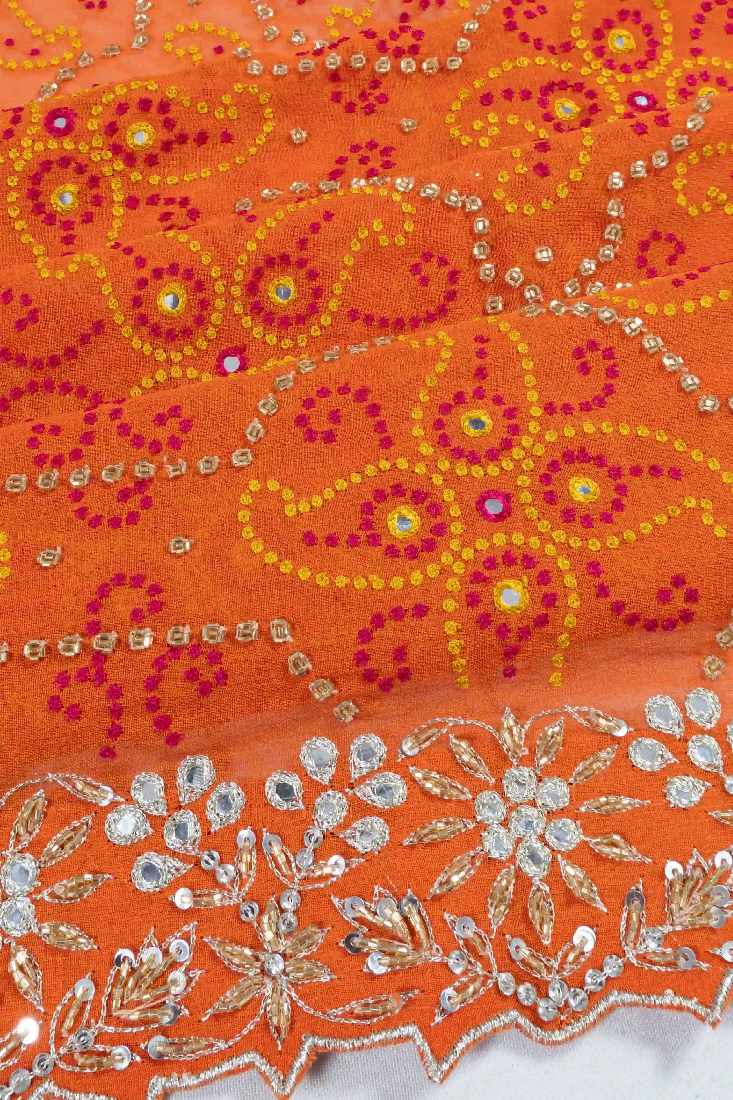 Ek Taar Georgette All Over Hand Embroidery Orange Saree With Scallop Border And Waist Belt