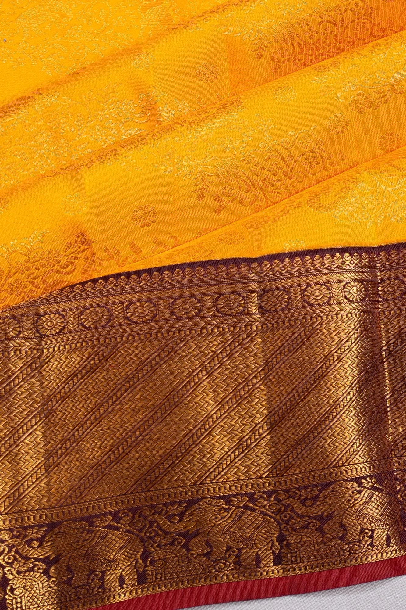 Taranga Kanchi Silk Jaal Yellow Saree