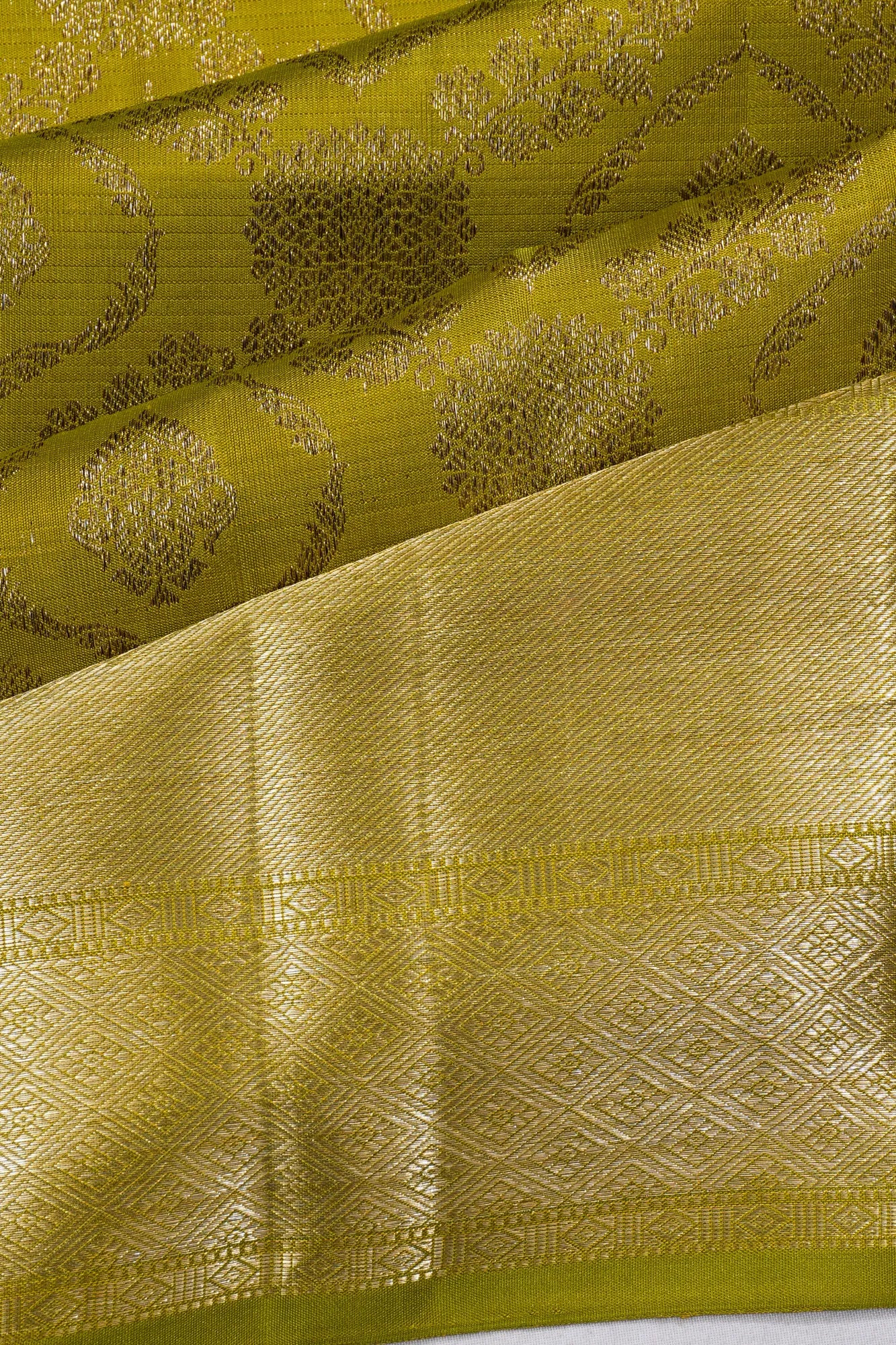 Kanchipuram Silk Jaal And Butta Mehendi Green Saree