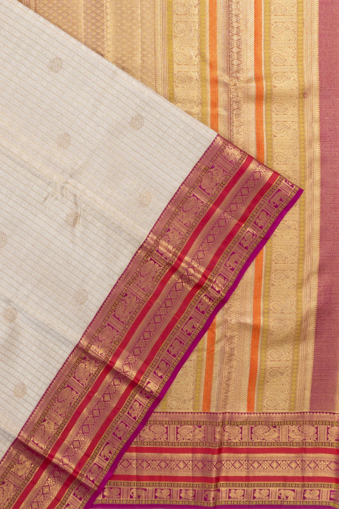 Taranga Kanchi Silk Checks And Butta White Saree