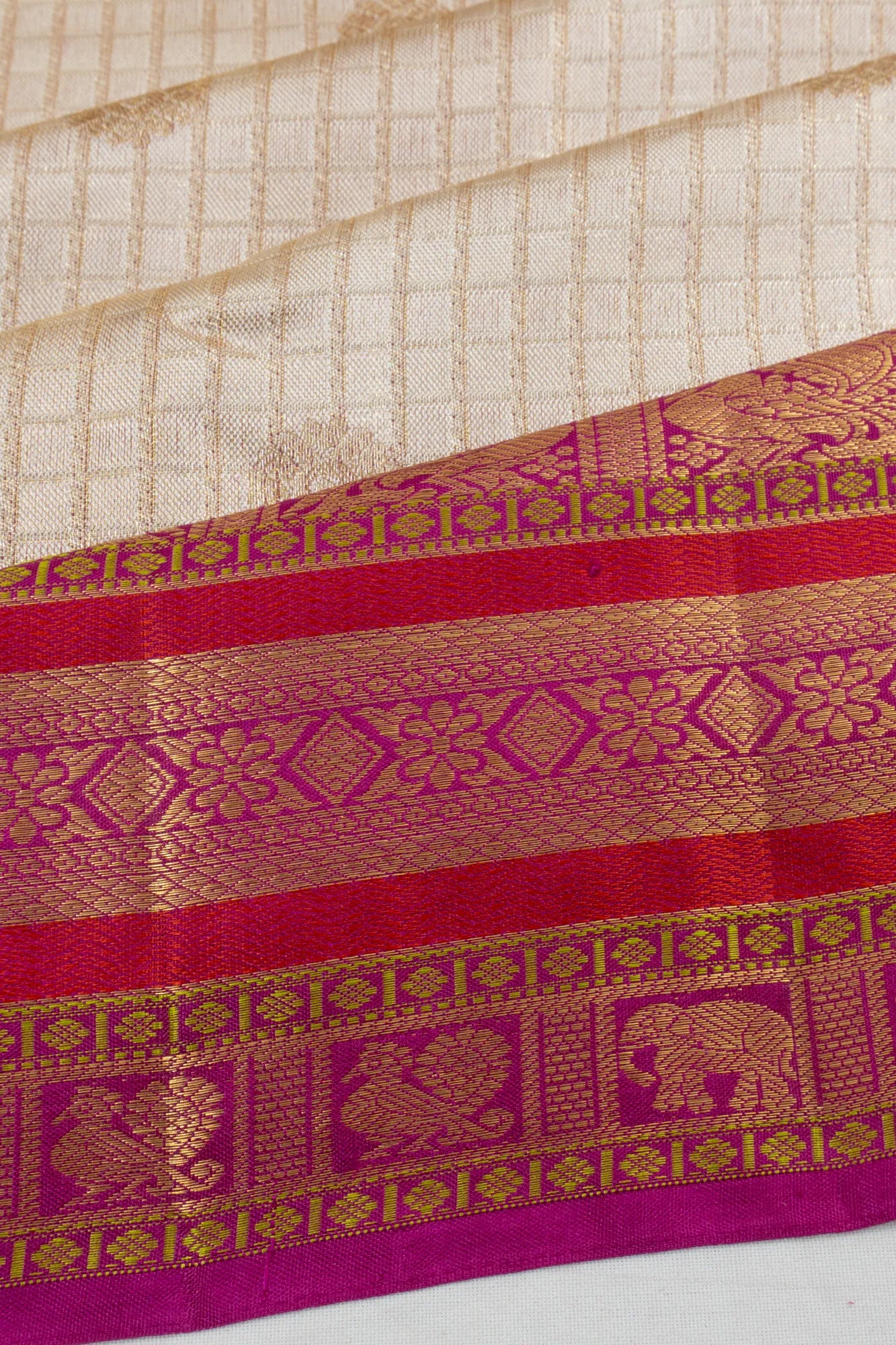 Taranga Kanchi Silk Checks And Butta White Saree