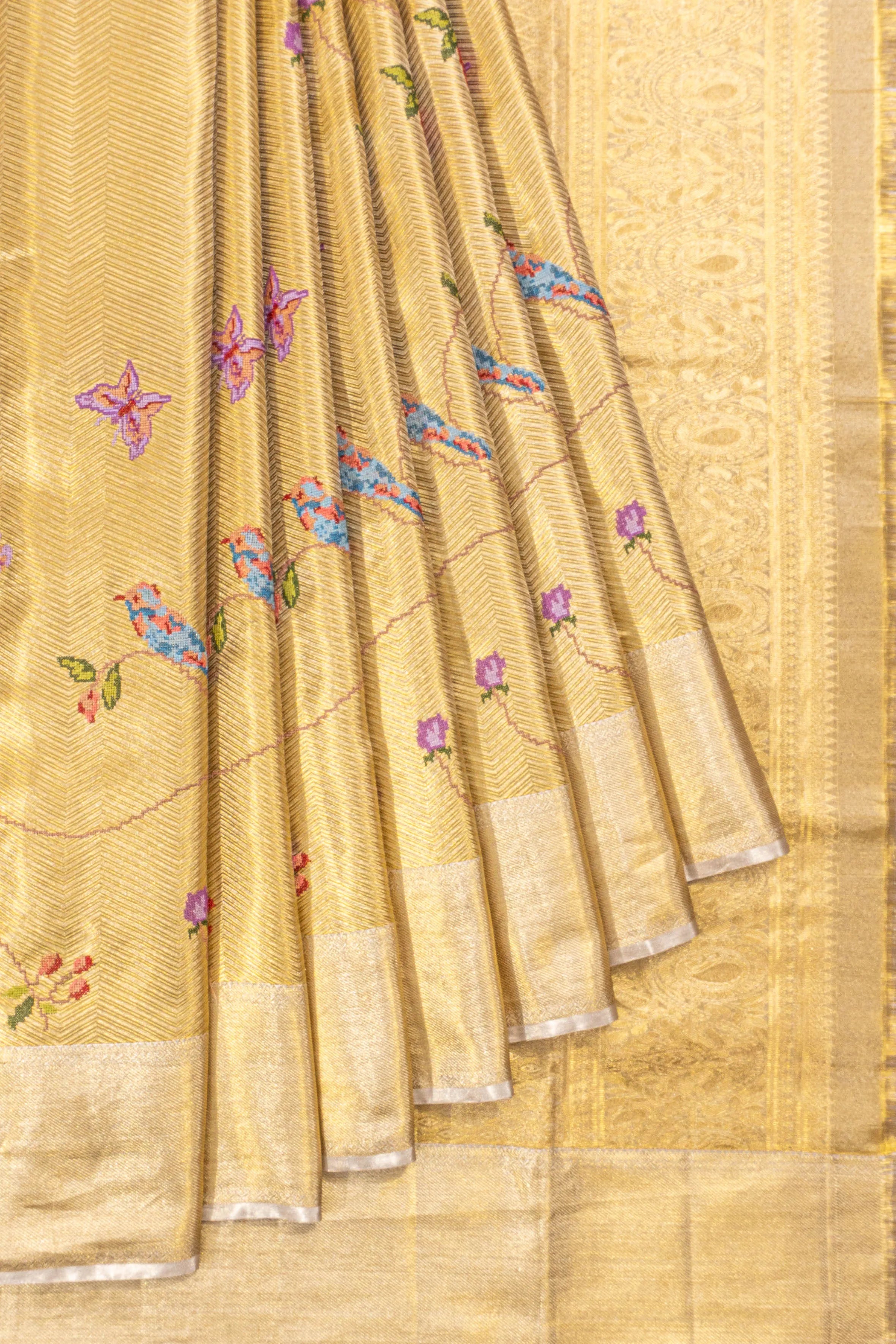 Taranga Kanchi Silk Tissue Chevron Lines Gold Saree With Embroidery