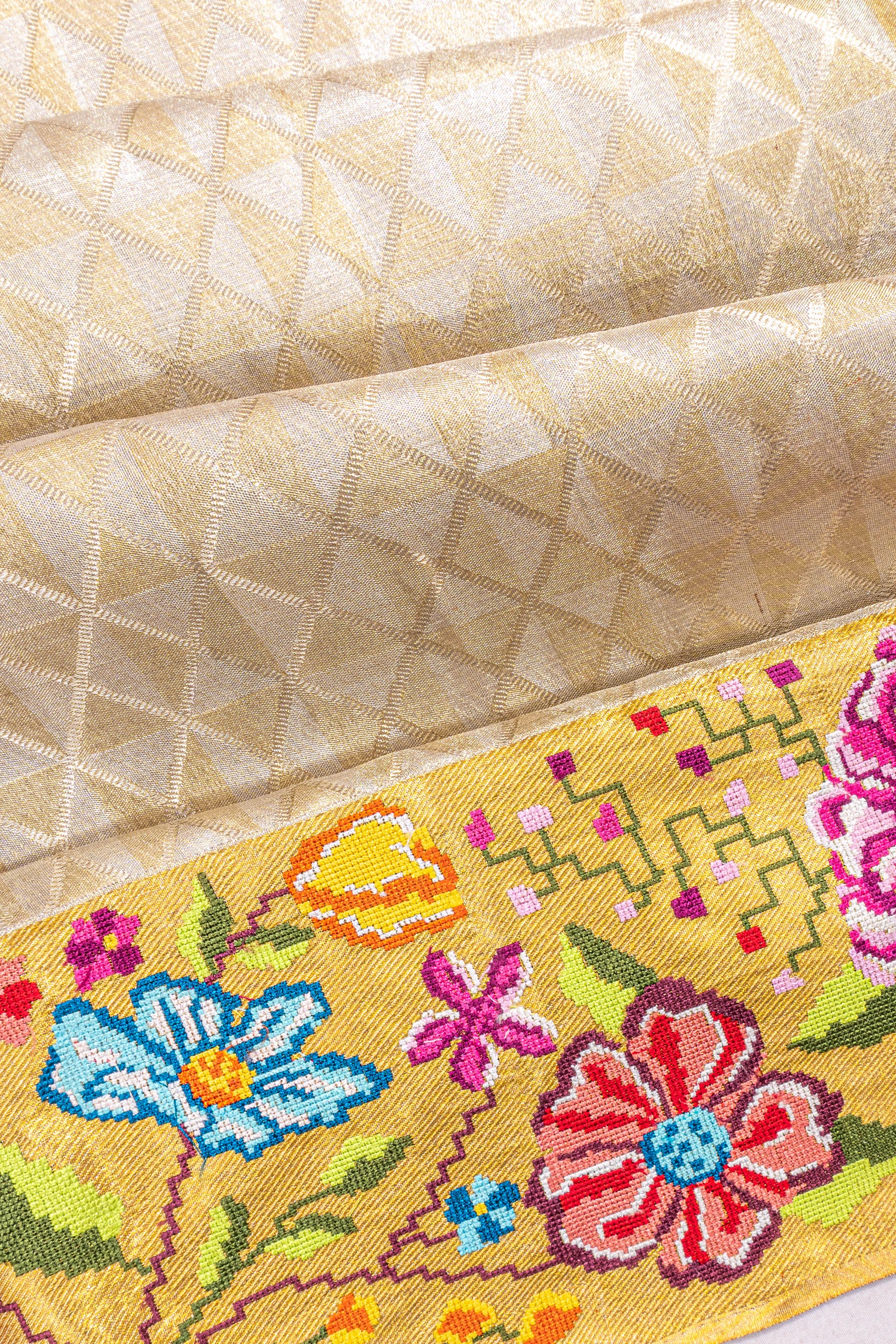 Kanchipuram Silk Tissue Geometrical Brocade Gold And Silver Saree With Embroidery Border