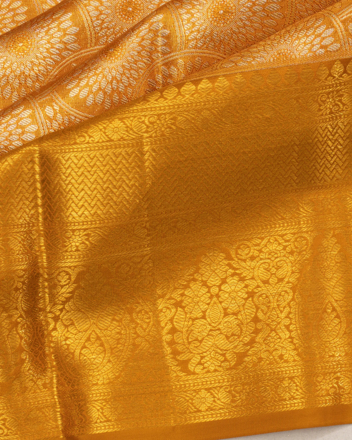 Taranga Kanchi Silk Tissue Brocade Gold Saree