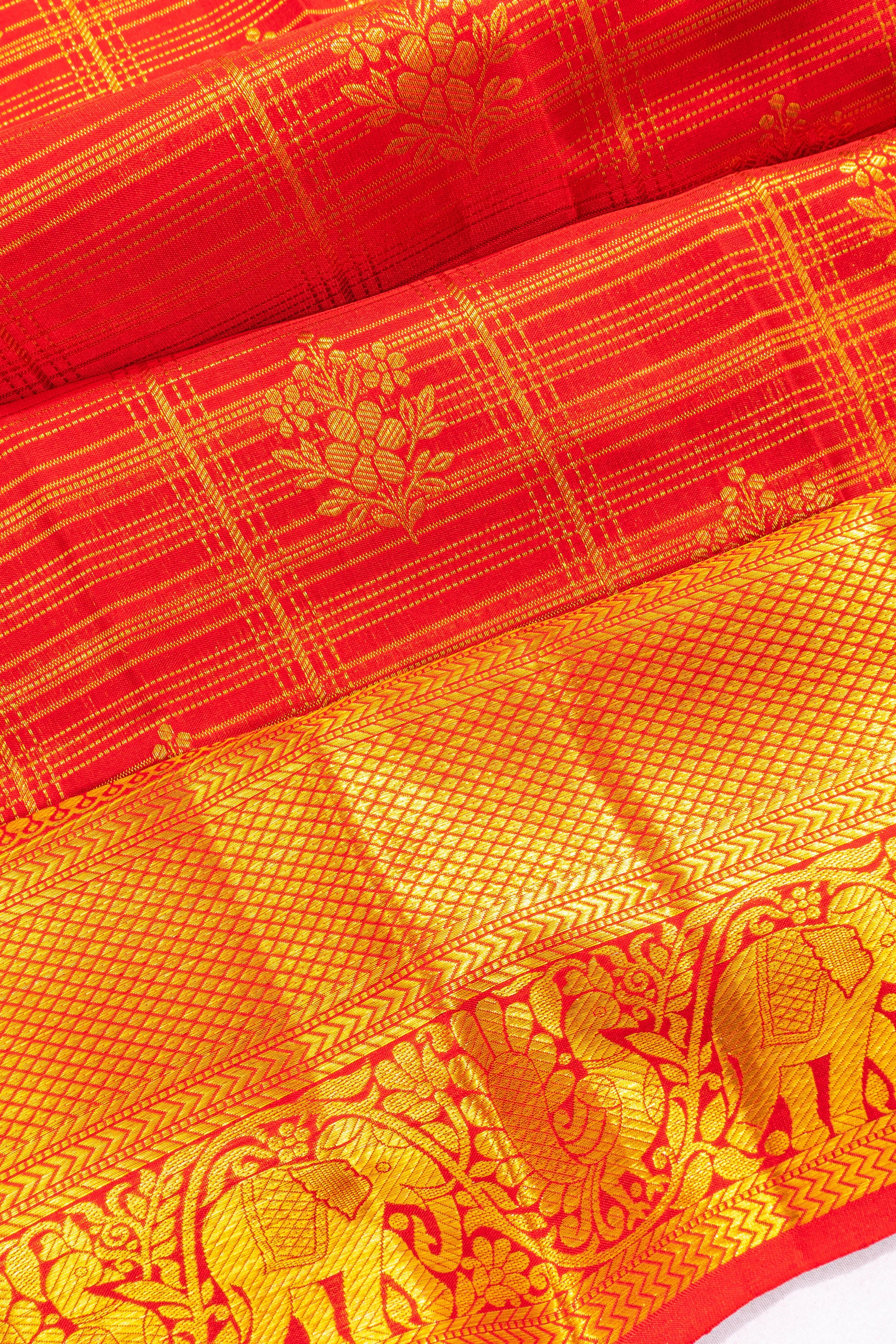 Taranga Kanchi Silk Checks And Butta Red Saree