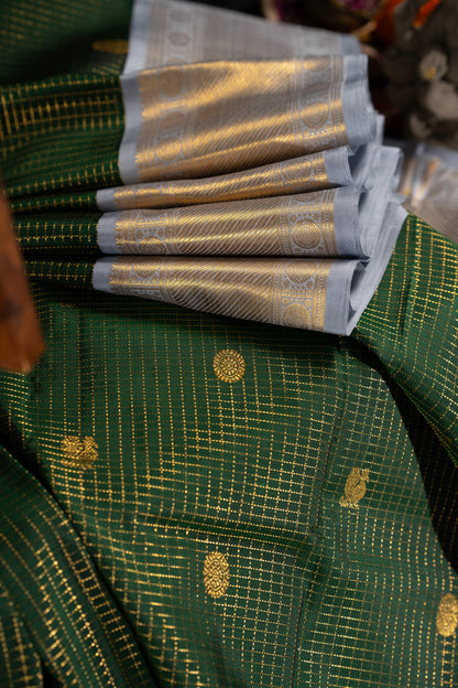 Kanchipuram Silk Checks And Butta Green Saree