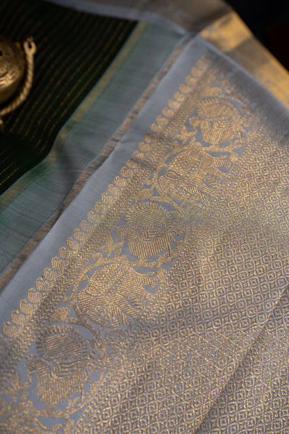 Kanchipuram Silk Checks And Butta Green Saree
