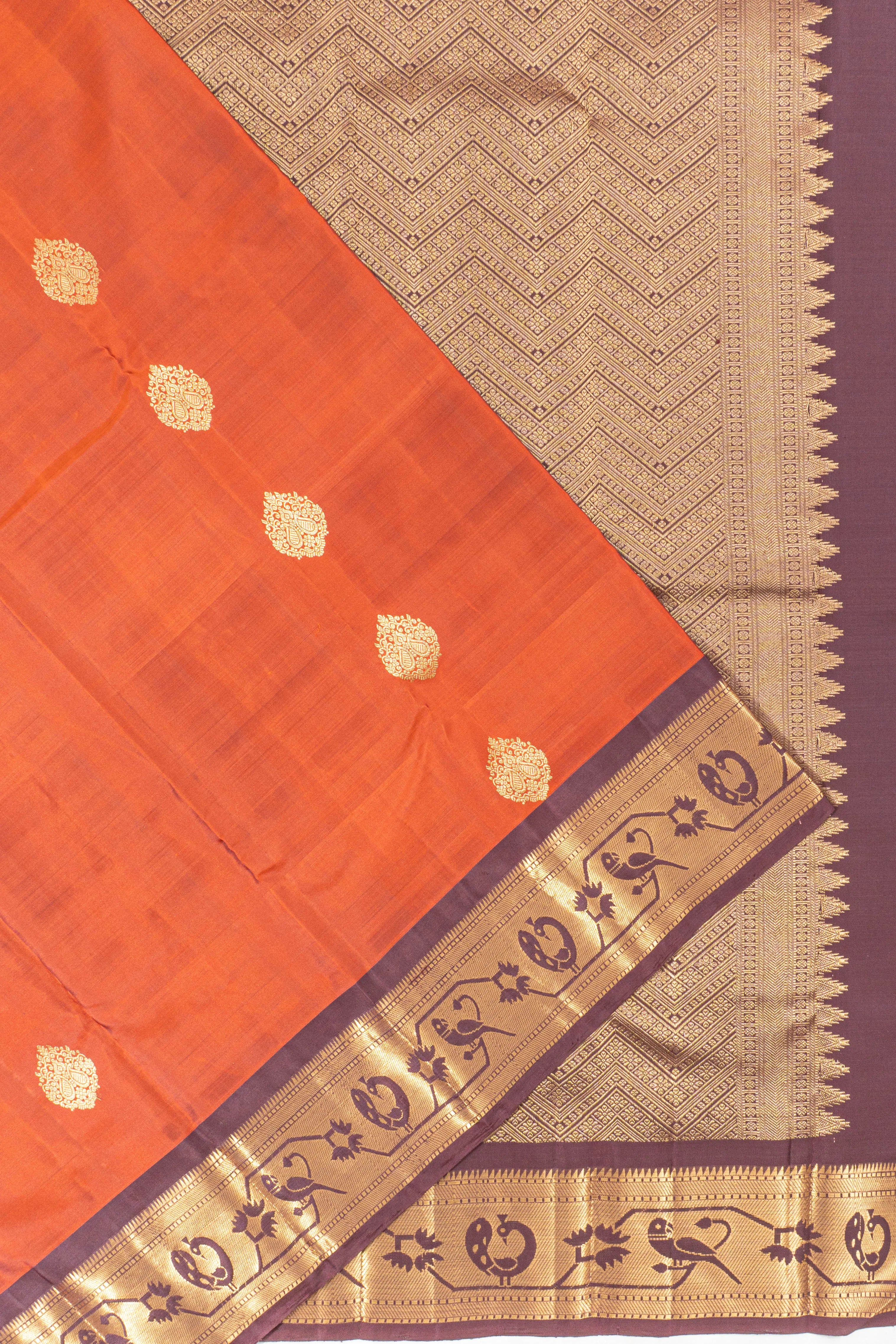 Taranga Kanchi Silk Butta Rust Orange Saree