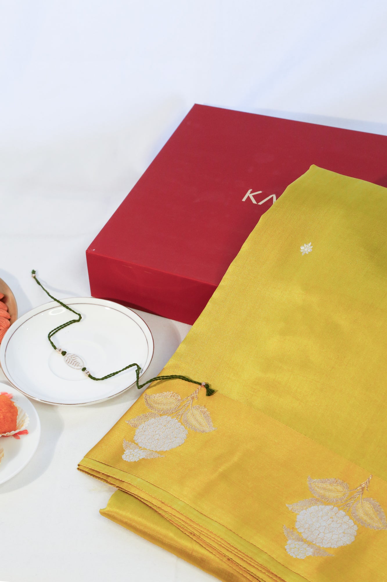 Banarasi Katan Silk Butta Mehendi Green Saree With Gift Box And Rakhi