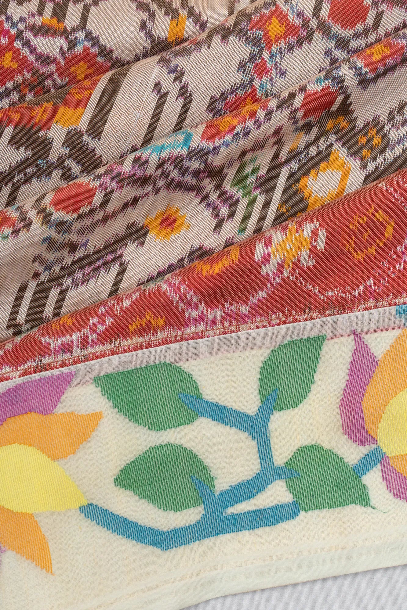Semi Patan Silk Ikat Grey Saree With Dhakai Kora Organza Border