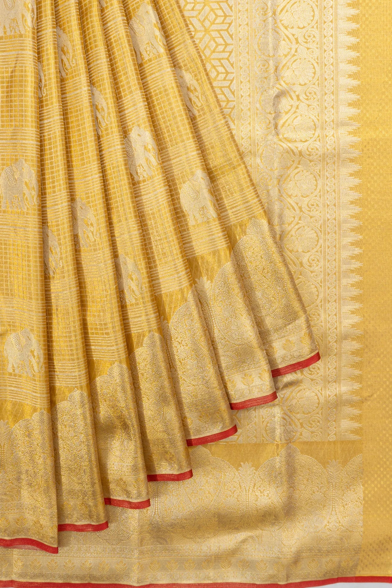 Taranga Kanchi Silk Tissue Checks And Butta Gold Saree