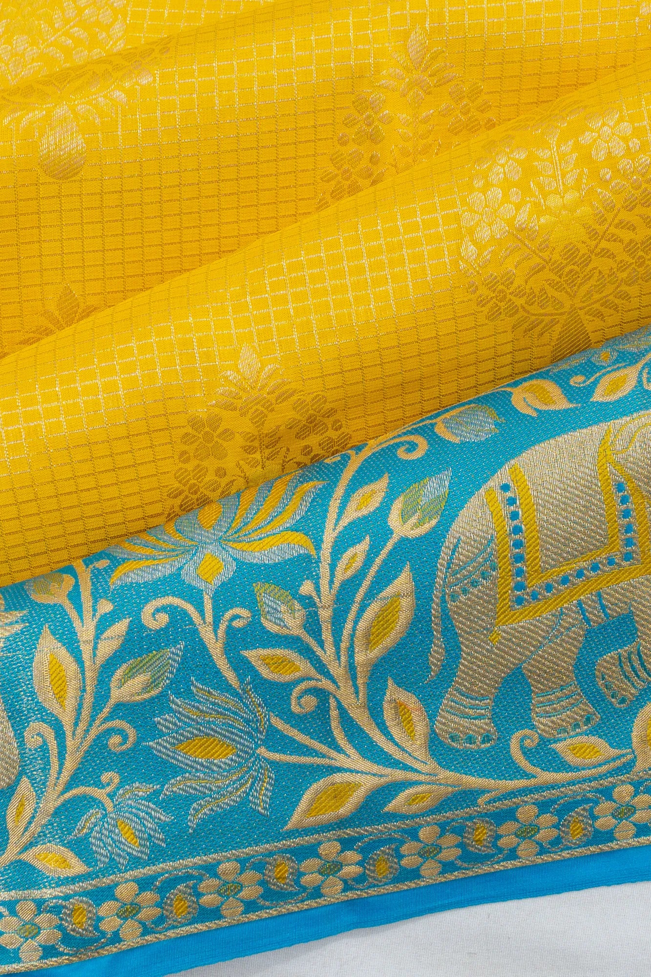 Taranga Kanchi Silk Checks And Butta Yellow Saree