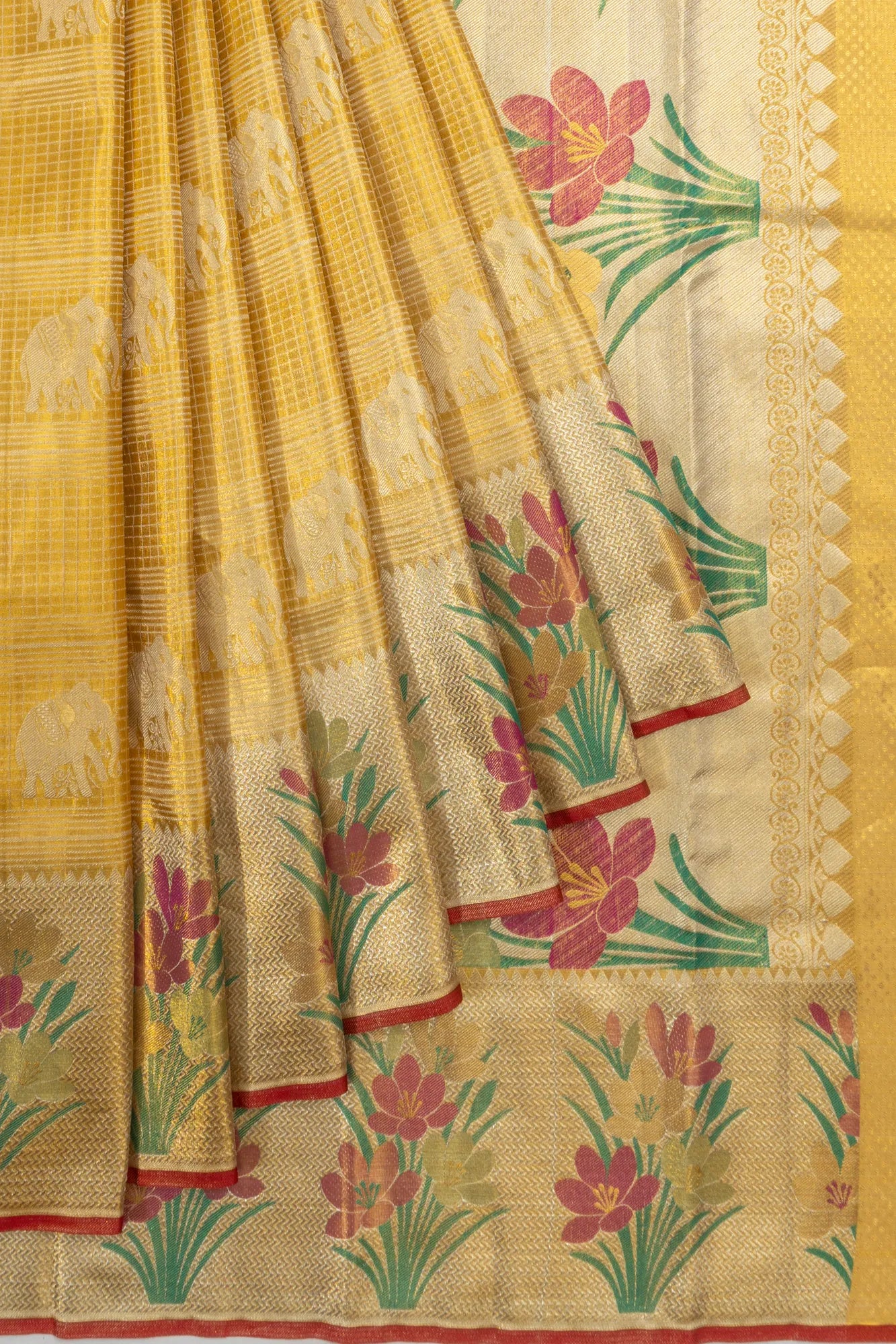 Taranga Kanchi Silk Tissue Checks And Butta Gold Saree