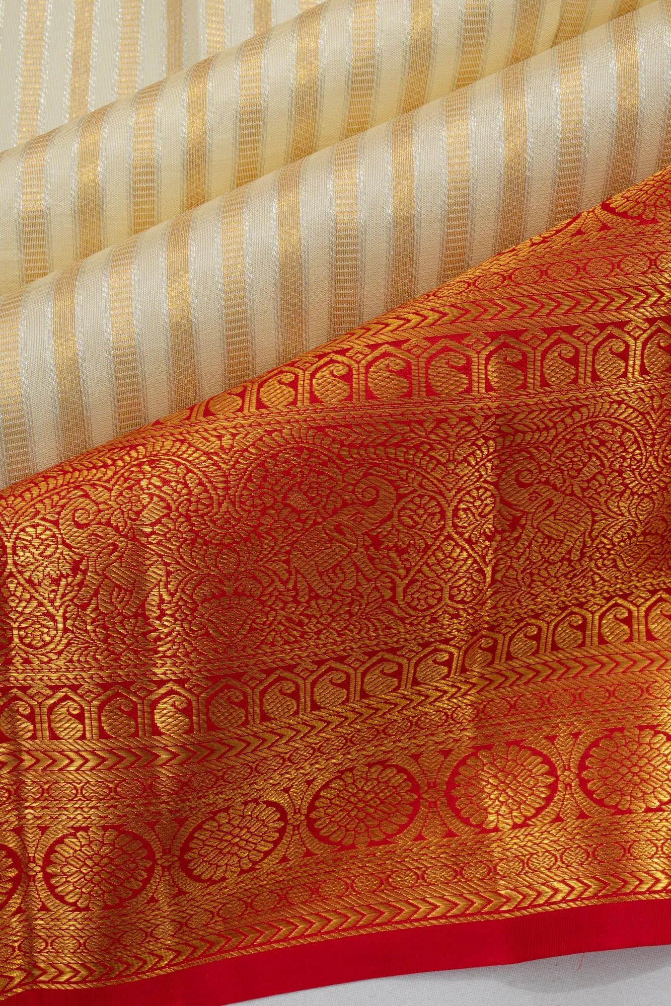 Taranga Kanchi Silk Brocade Cream Saree